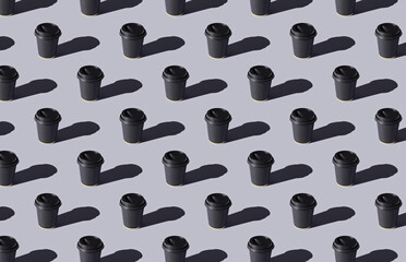 Pattern of coffee cups on pruple background