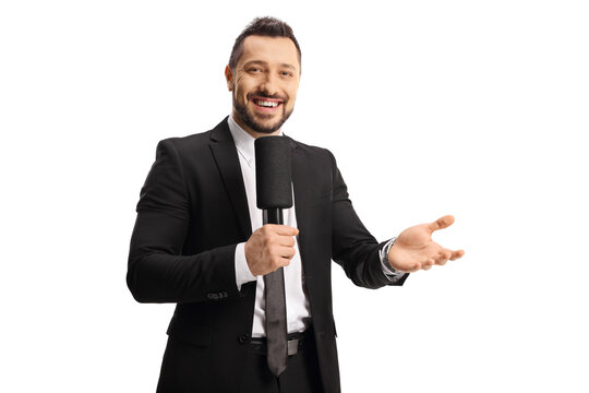 Male tv host smiling and holding a microphone