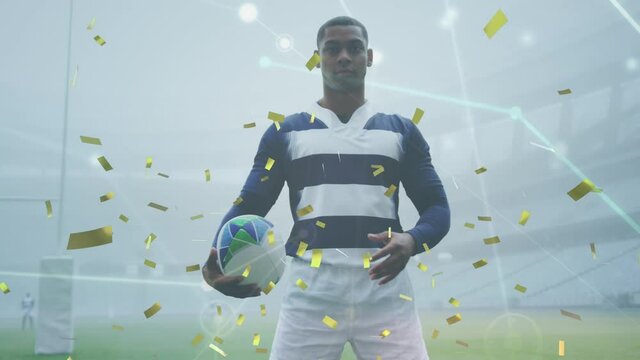 Animation of confetti and network of connections over rugby player over sports stadium