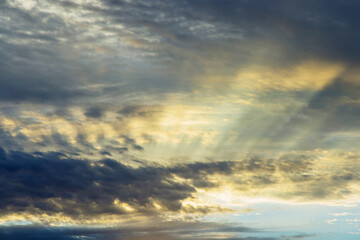 Obraz premium Dramatic soft sunrise, beautiful pink violet orange clouds against blue sky