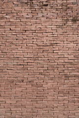 Vertical view of Red brick and old cement surface for background and texture
