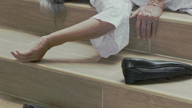 Domestic accident of a elderly woman falling down at home