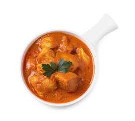 Bowl of delicious chicken curry on white background, top view