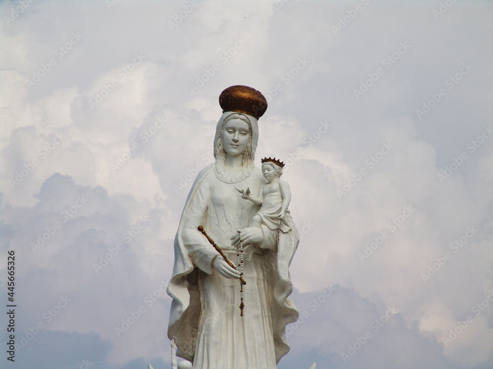 Poster Monument to the Virgin of Chiquinquira in Maracaibo, Venezuela against a cloudy sky