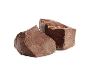 Pieces of tasty milk chocolate on white background
