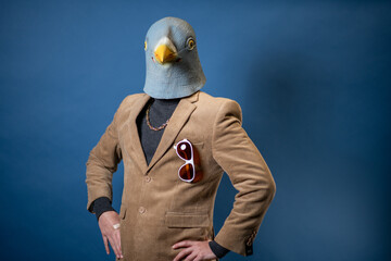 Pigeon Man Wearing Suit With Gold Chain