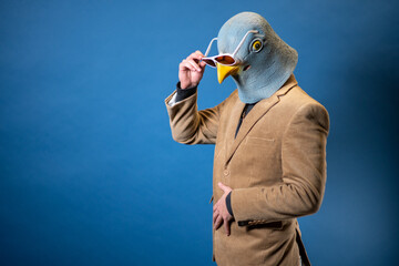 Pigeon Man Wearing Suit With Gold Chain