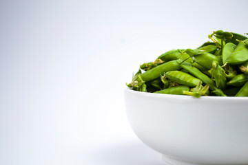 fresh green peas vegetable in white background