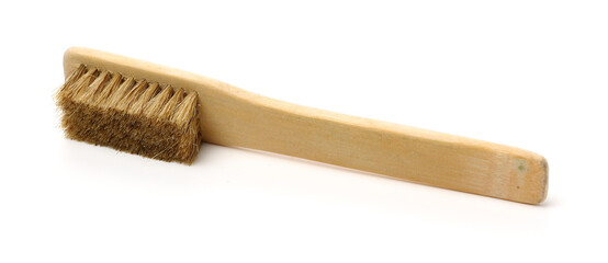Natural bristle shoes brush with wood handle isolated on white background