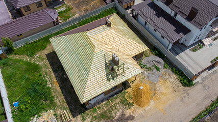 Roofing Contractors Installing House Roof Board for Asphalt Shingles. Roofing Construction. Roof Repair.