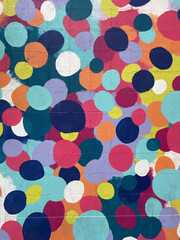 background with circles or colorful dots painted on a wall