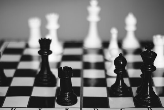 Chess pieces on a chessboard.