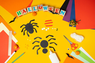 Step 3. DIY Halloween paper spider. Halloween craft step by step instructions. Children's paper craft for Halloween.