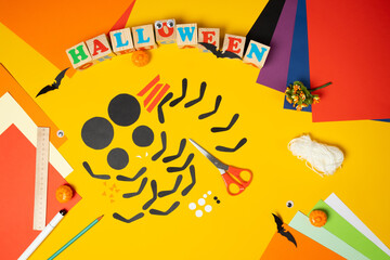 Step 2. DIY Halloween paper spider. Halloween craft step by step instructions. Children's paper craft for Halloween.