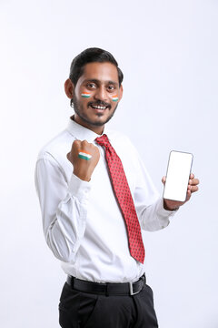 Independence day offer concept : Young indian showing smartphone.