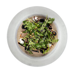 Isolated beet root and arugula salad with cheese on white background