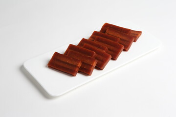 chinese sticky sweet brown sugar glutinous rice Nian gao in traditional money yuan bao and cute pig shape design asian dessert halal menu for chinese new year festival