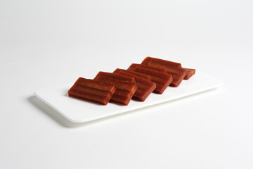 chinese sticky sweet brown sugar glutinous rice Nian gao in traditional money yuan bao and cute pig shape design asian dessert halal menu for chinese new year festival