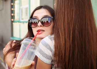 woman drinking cold coffee