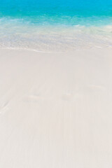 Fototapeta na wymiar Wave of the sea on the sand beach at Similan islands, Thailand.