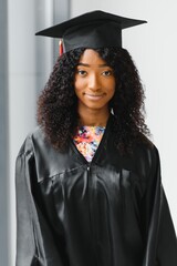 Excited African American woman at her graduation.