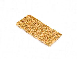 Sesame brittle bar on white background.