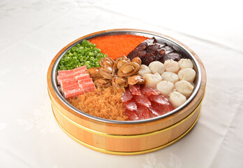 cny colourful treasure pot set with rice, meat and seafood with abalone, scallop, sausage, egg, vegetable, pork, prawn, duck, chicken floss, waxed meat in big platter sushi bento takeaway banquet