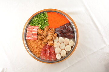 cny colourful treasure pot set with rice, meat and seafood with abalone, scallop, sausage, egg, vegetable, pork, prawn, duck, chicken floss, waxed meat in big platter sushi bento takeaway banquet