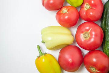 Vegetables on a white background. Ripe natural vegetables. Healthy diet. Vegetables close-up