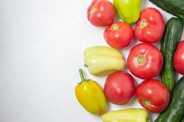 Vegetables on a white background. Ripe natural vegetables. Healthy diet. Vegetables close-up