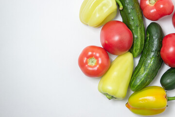 Vegetables on a white background. Ripe natural vegetables. Healthy diet. Vegetables close-up