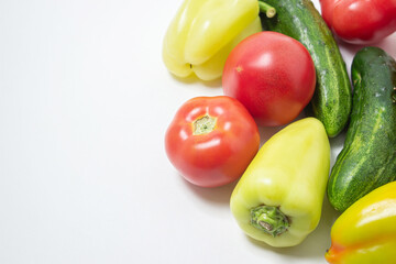 Vegetables on a white background. Ripe natural vegetables. Healthy diet. Vegetables close-up