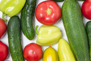 Vegetables on a white background. Ripe natural vegetables. Healthy diet. Vegetables close-up