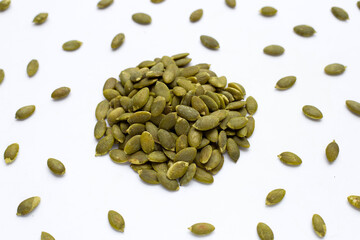 Pumpkin seeds on white background