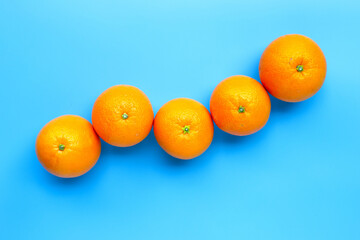 High vitamin C, Juicy and sweet Fresh orange fruit on blue background
