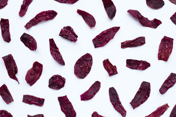 Purple sweet potato chips on white