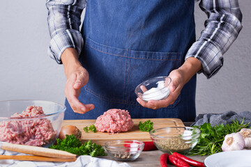 Raw beef and pork cutlets preparation at home