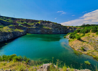 Fototapeta na wymiar The emerald lake from Racos - Romania