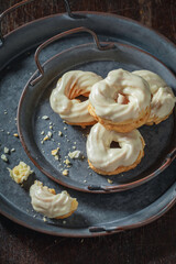 Sweet spanish donuts with white chocolate. Traditional spanish cuisine.