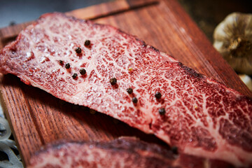 fresh raw beef on a chopping board