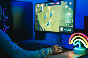 Streamer gamer playing at strategy game online - Focus on right hand