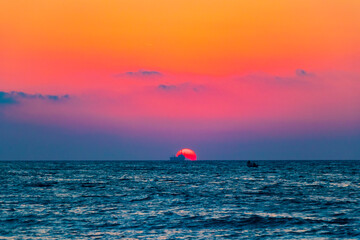 The most beautiful colorful sunset at Ialysos Beach Rhodes Greece.