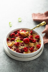 Traditional homemade raspberry crumble with fresh mint
