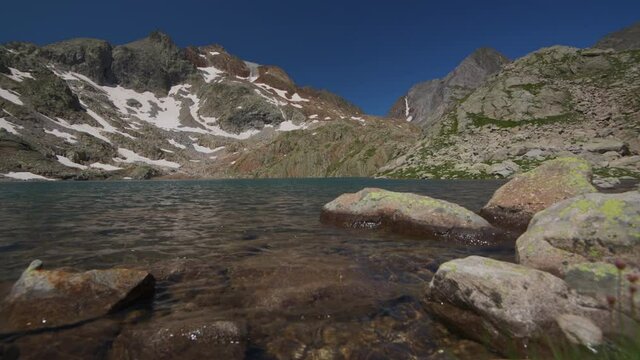 One of the Azul Lakes with Piedrafita peak and Infierno peak, Pyrenees, Tena Valley, Huesca Province, Aragon, Spain