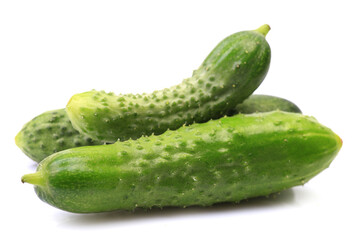 Fresh cucumbers on a white background