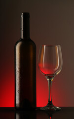 empty wine bottle with goblet
