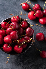 Plate of juicy fresh ripe cherries close up