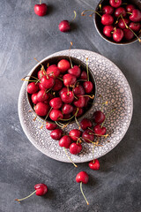 Plate of juicy fresh ripe cherries close up