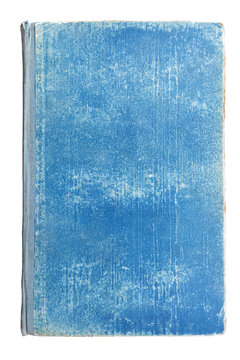 The beginning of the book. A blank blue page of an old book with texture and binding made of textile material. Flyleaf of an old book.