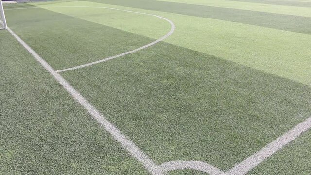 Soccer field with artificial turf in a stadium